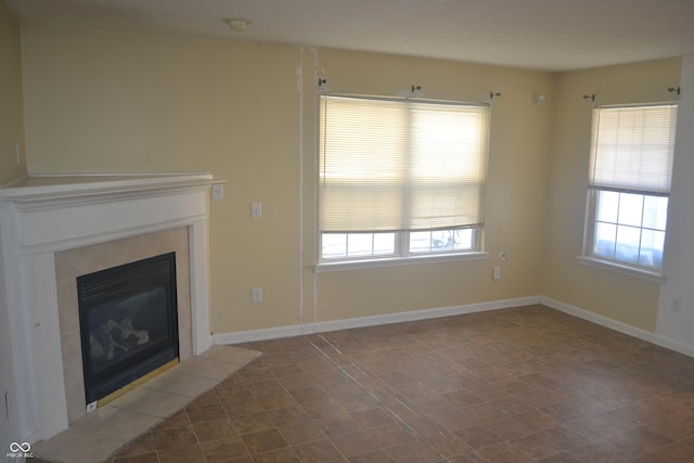 unfurnished living room featuring a fireplace