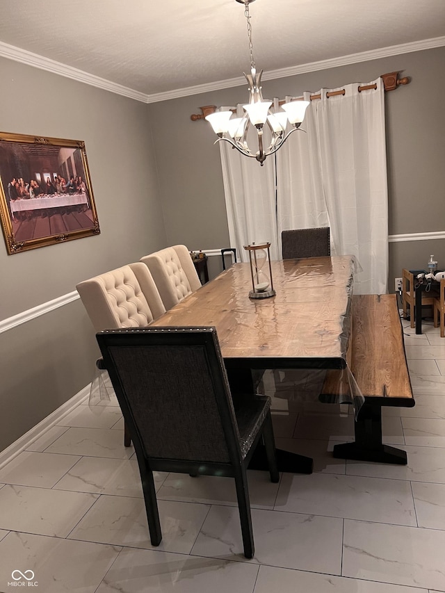 dining room with a chandelier and ornamental molding