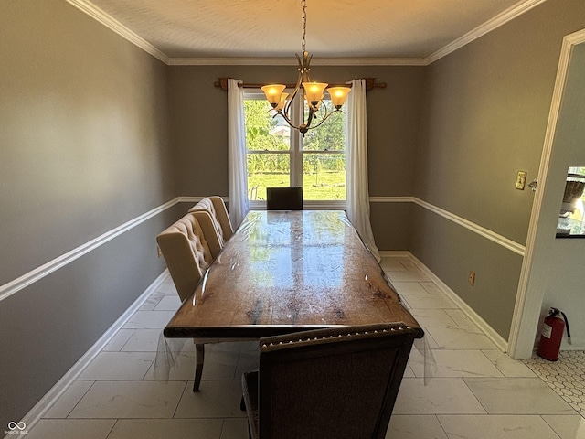 11720 Grenadier Ln, Indianapolis, IN 46229 - dining room featuring marble finish floors, a chandelier, baseboards, and ornamental molding