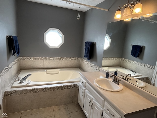 11720 Grenadier Ln, Indianapolis, IN 46229 - bathroom with tile patterned floors, a bath, and vanity