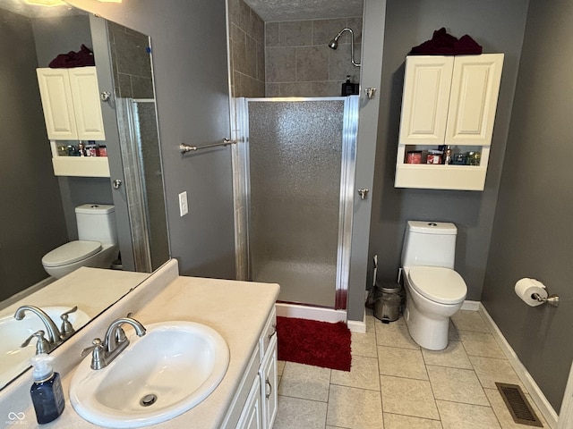 11720 Grenadier Ln, Indianapolis, IN 46229 - full bathroom with toilet, a shower stall, baseboards, and vanity