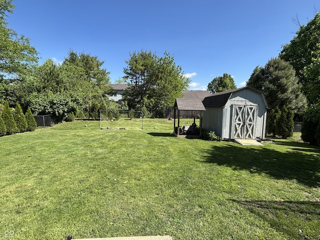 11720 Grenadier Ln, Indianapolis, IN 46229 - view of yard featuring a shed and an outdoor structure