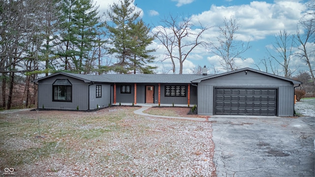 ranch-style house featuring a garage