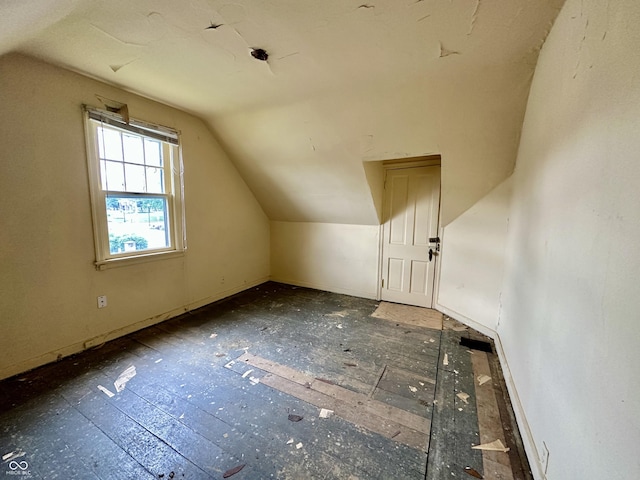 bonus room featuring lofted ceiling