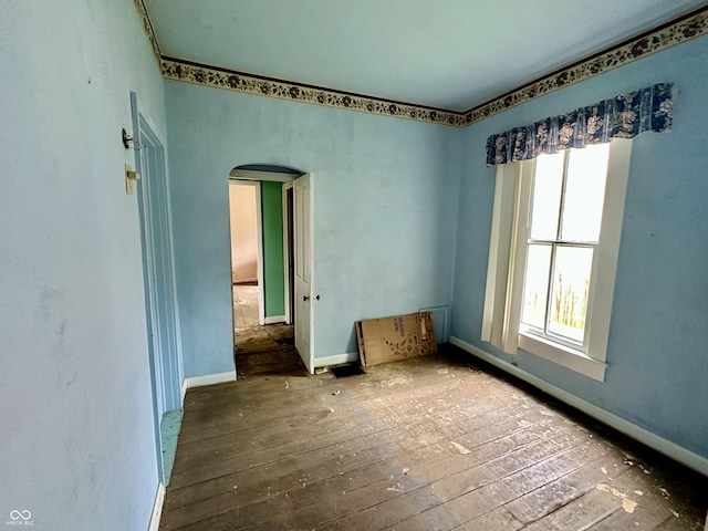 spare room featuring hardwood / wood-style flooring