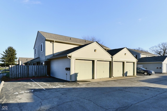 view of home's exterior with a garage