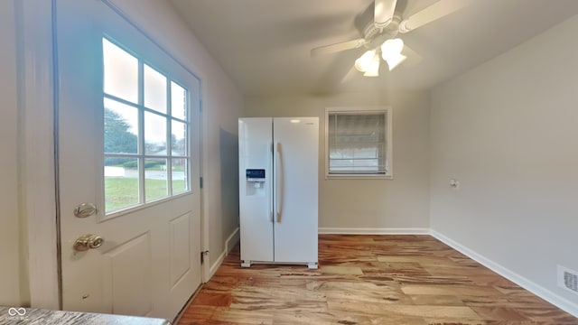 entryway featuring ceiling fan and light hardwood / wood-style flooring