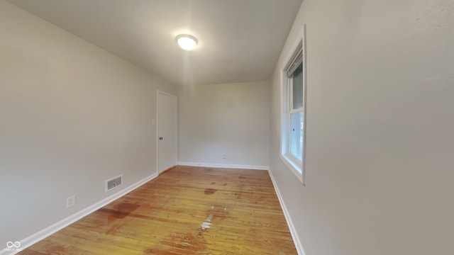 empty room featuring hardwood / wood-style floors