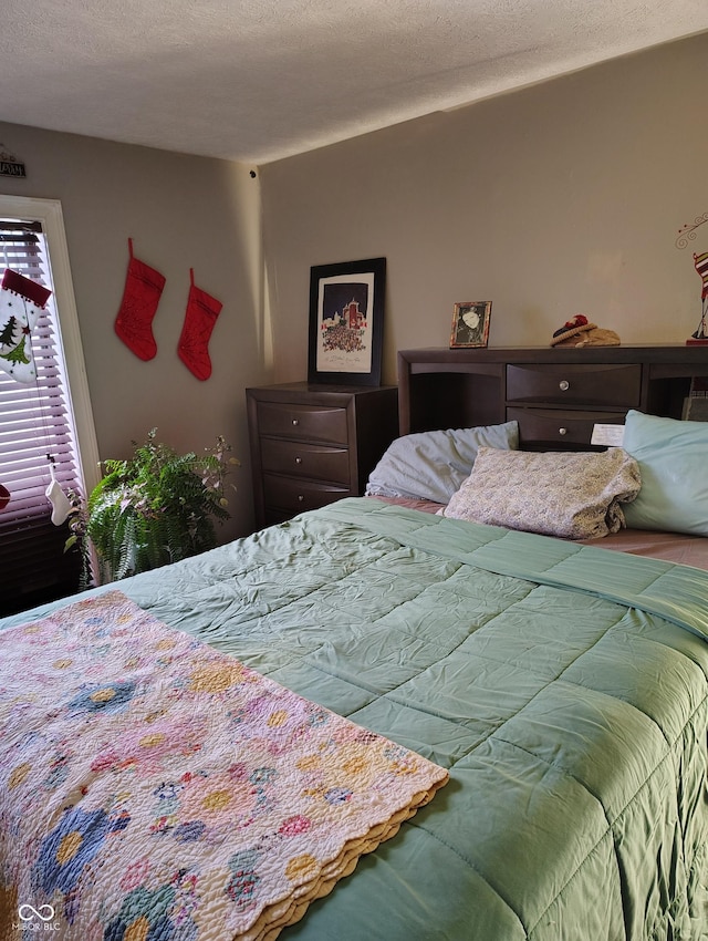 bedroom with a textured ceiling