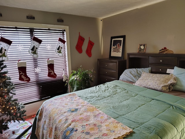 bedroom featuring a textured ceiling