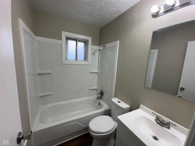 full bathroom featuring tub / shower combination, vanity, a textured ceiling, hardwood / wood-style floors, and toilet