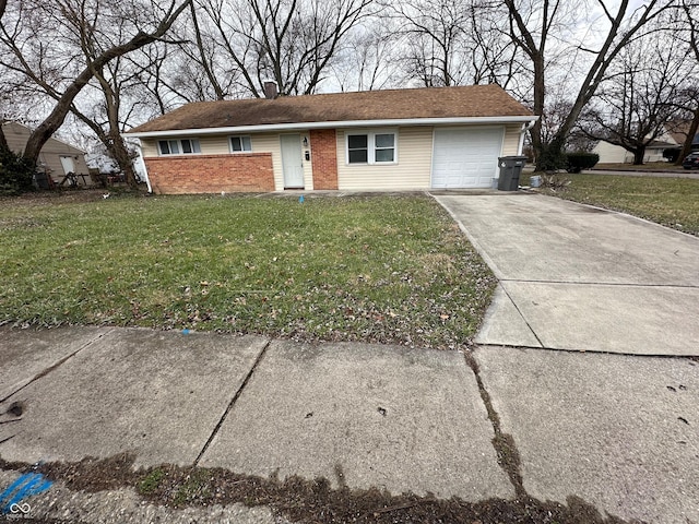 ranch-style house with a garage and a front lawn