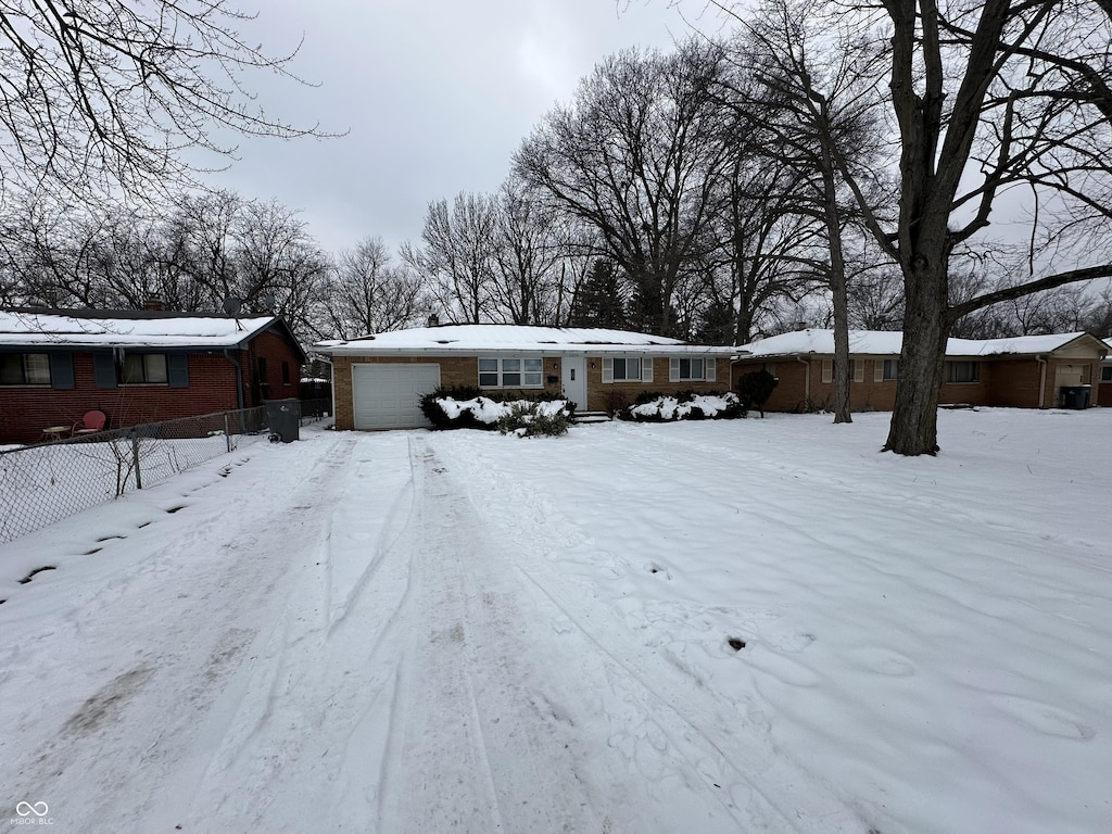 single story home with a garage