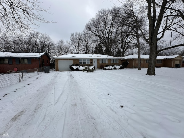 single story home with a garage