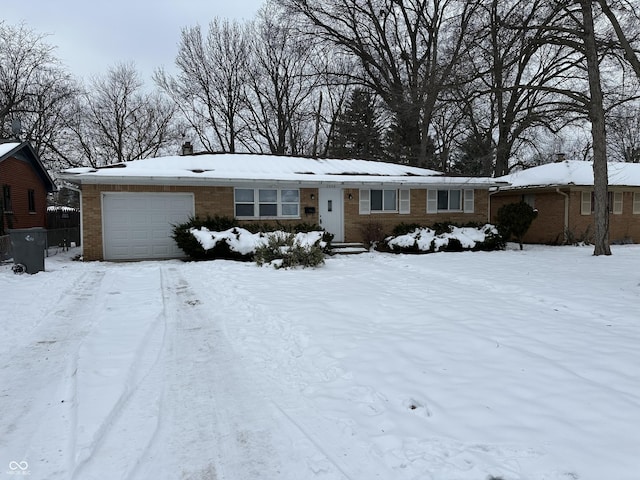 single story home with a garage