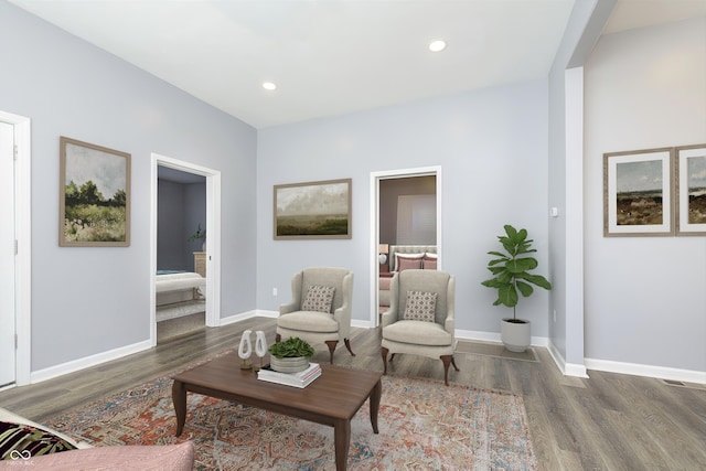 living area featuring dark hardwood / wood-style flooring