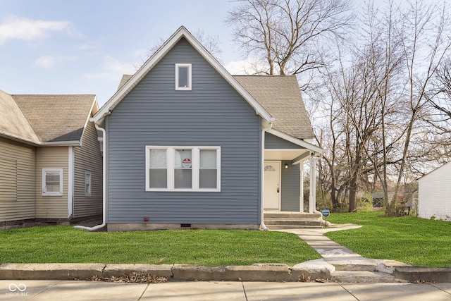 209 Trowbridge St, Indianapolis, IN 46201 - bungalow-style home with a front lawn