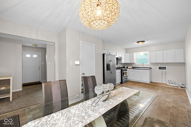 dining room featuring sink