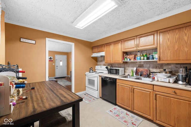 kitchen featuring backsplash, crown molding, white appliances, and sink