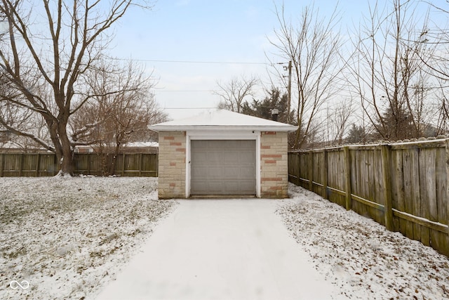 view of snow covered garage