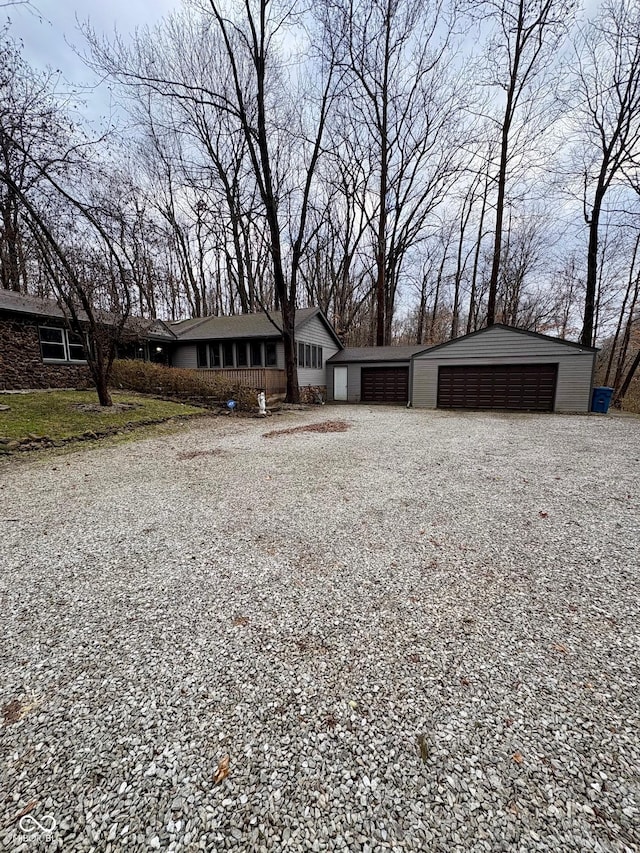 single story home with a garage