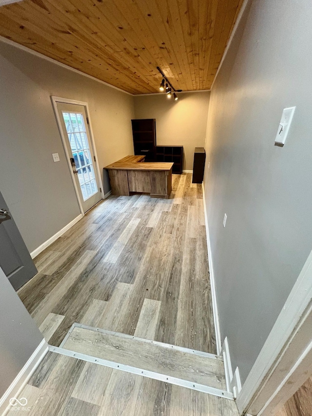 interior space featuring hardwood / wood-style floors and wood ceiling