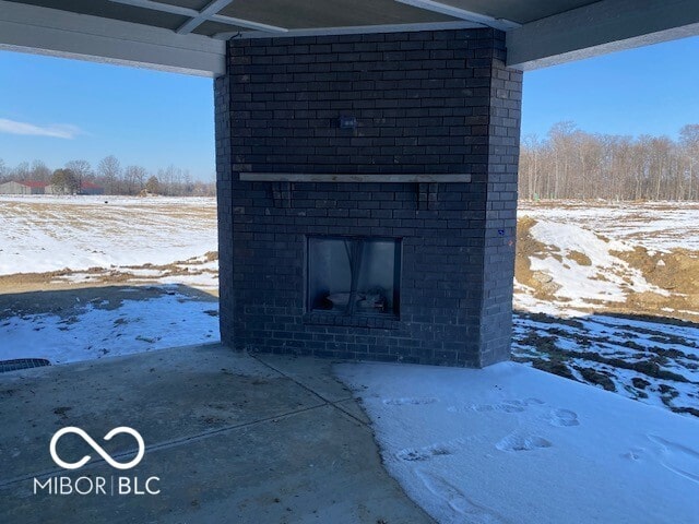 view of snow covered patio