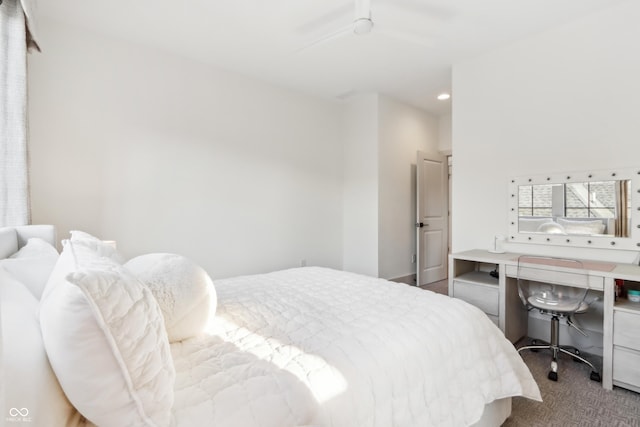 carpeted bedroom with ceiling fan