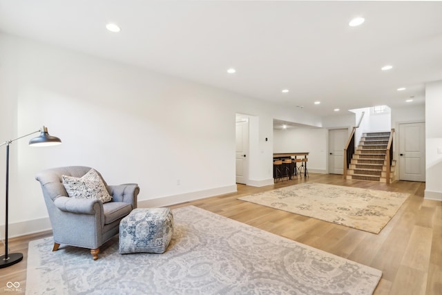 sitting room with light hardwood / wood-style floors