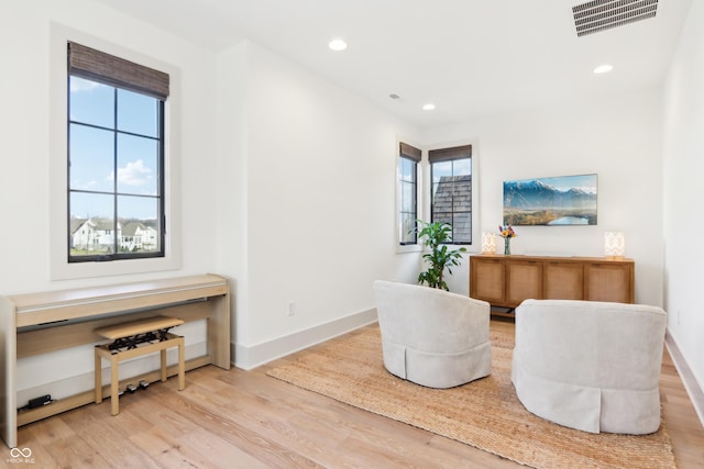 living area featuring light wood-type flooring