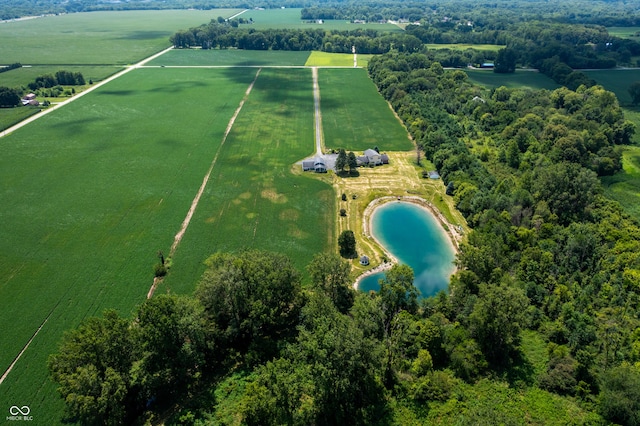 drone / aerial view with a rural view and a water view