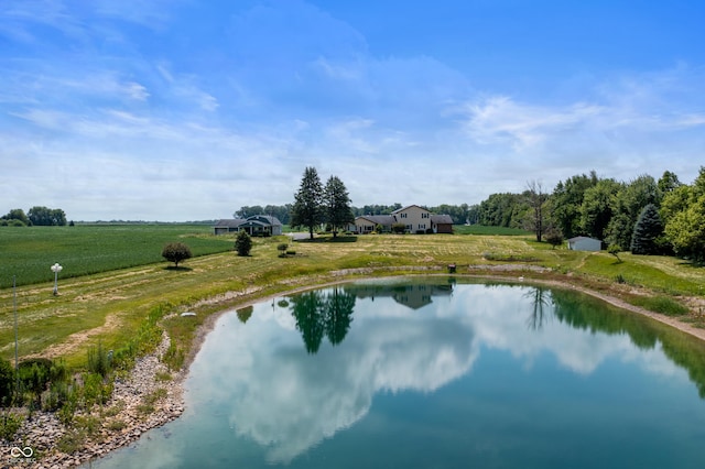 drone / aerial view featuring a water view and a rural view