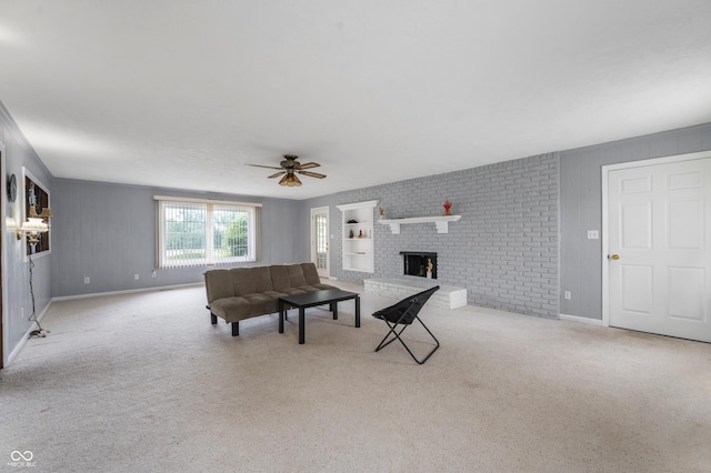 4832 E 200 N, Anderson, IN 46012 - living area featuring a ceiling fan, carpet flooring, and a fireplace