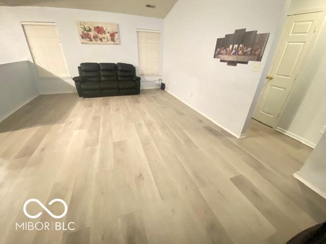 unfurnished room with light hardwood / wood-style floors