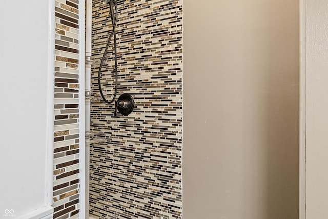 room details with a tile shower