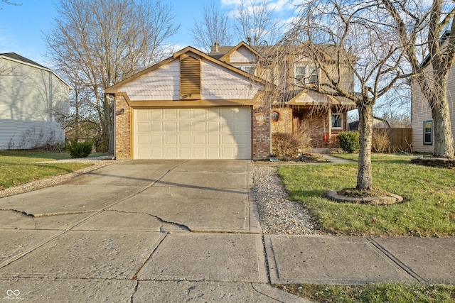 view of front facade featuring a front yard and a garage