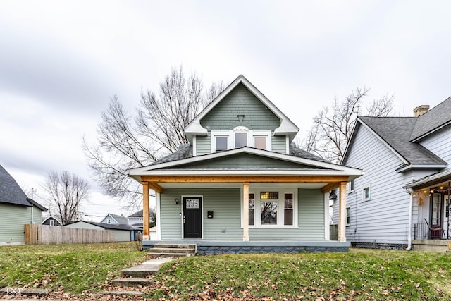 view of front of property featuring covered porch