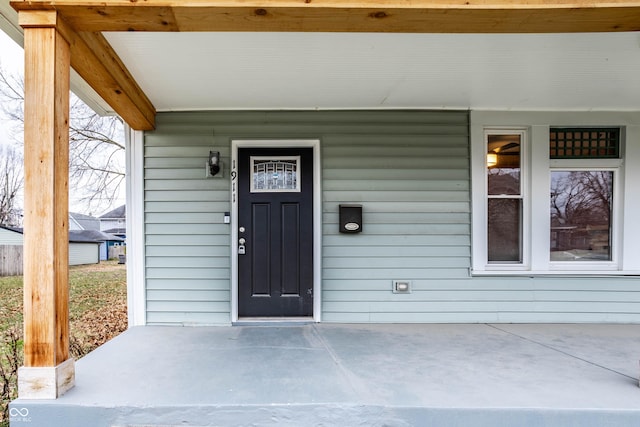 doorway to property with covered porch