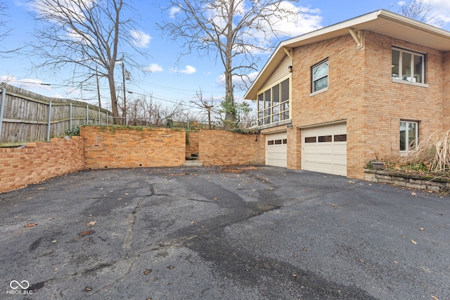 view of home's exterior featuring a garage