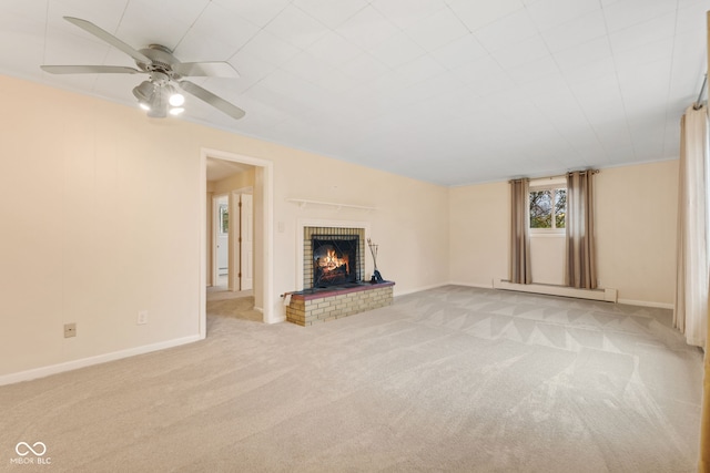 unfurnished living room featuring a fireplace, light colored carpet, and a baseboard heating unit