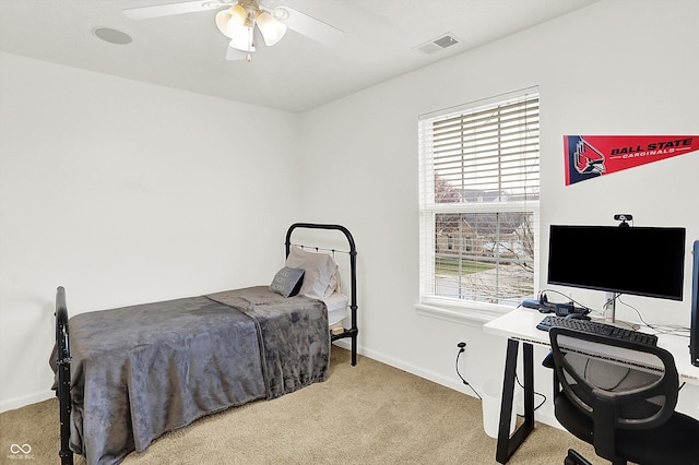 carpeted bedroom featuring ceiling fan