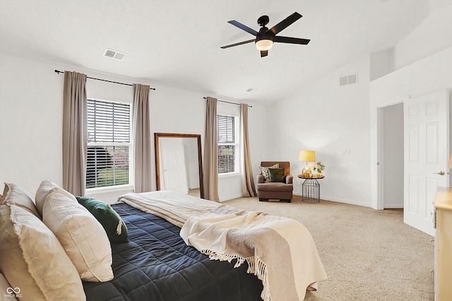 bedroom featuring light carpet, ceiling fan, and lofted ceiling