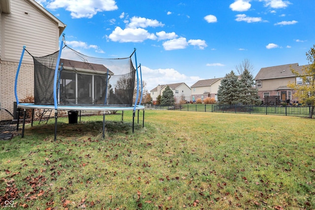 view of yard featuring a trampoline