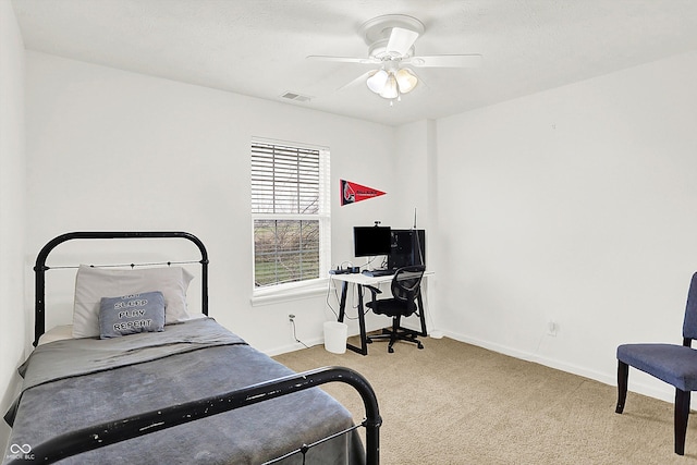 carpeted bedroom with ceiling fan