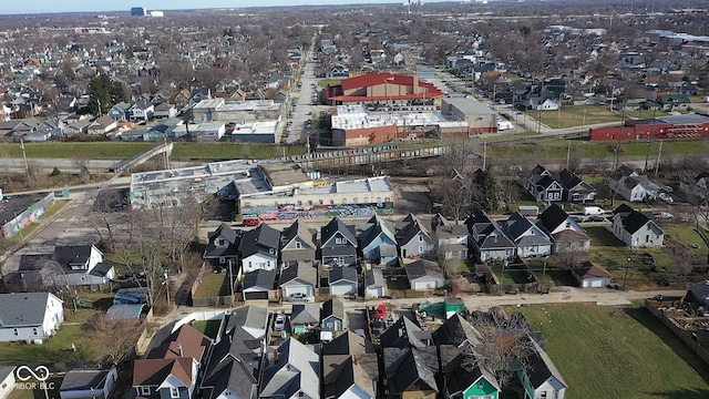 birds eye view of property with a residential view