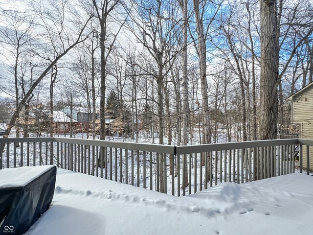 view of snow covered deck