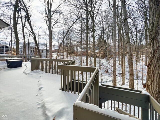 view of snow covered deck