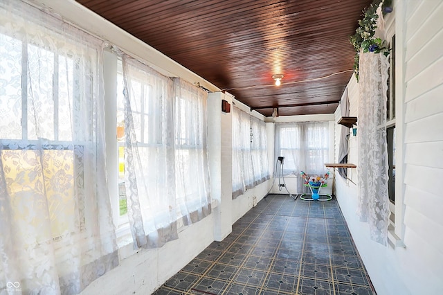 corridor featuring wooden ceiling