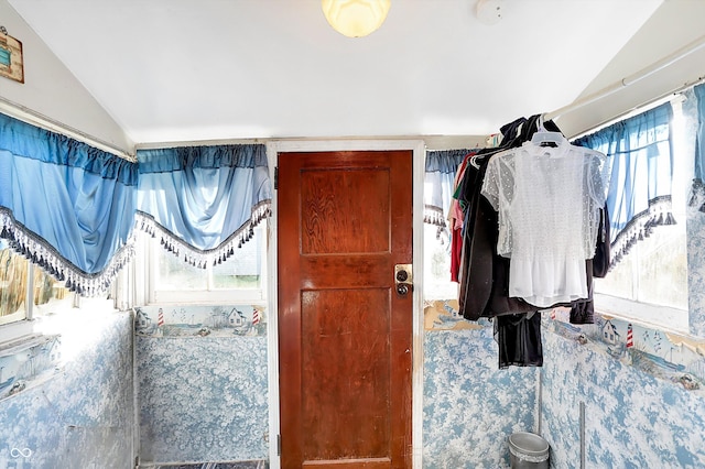 spacious closet with vaulted ceiling