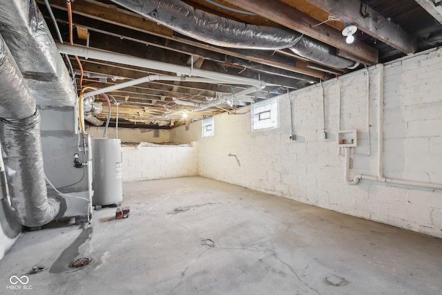 basement featuring gas water heater